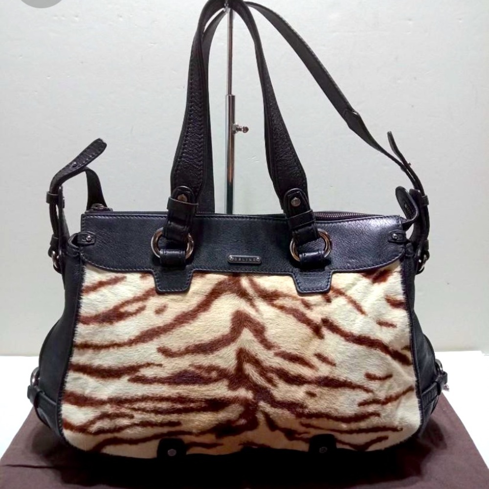 CELINE HOMME
Lirine tiger print tote